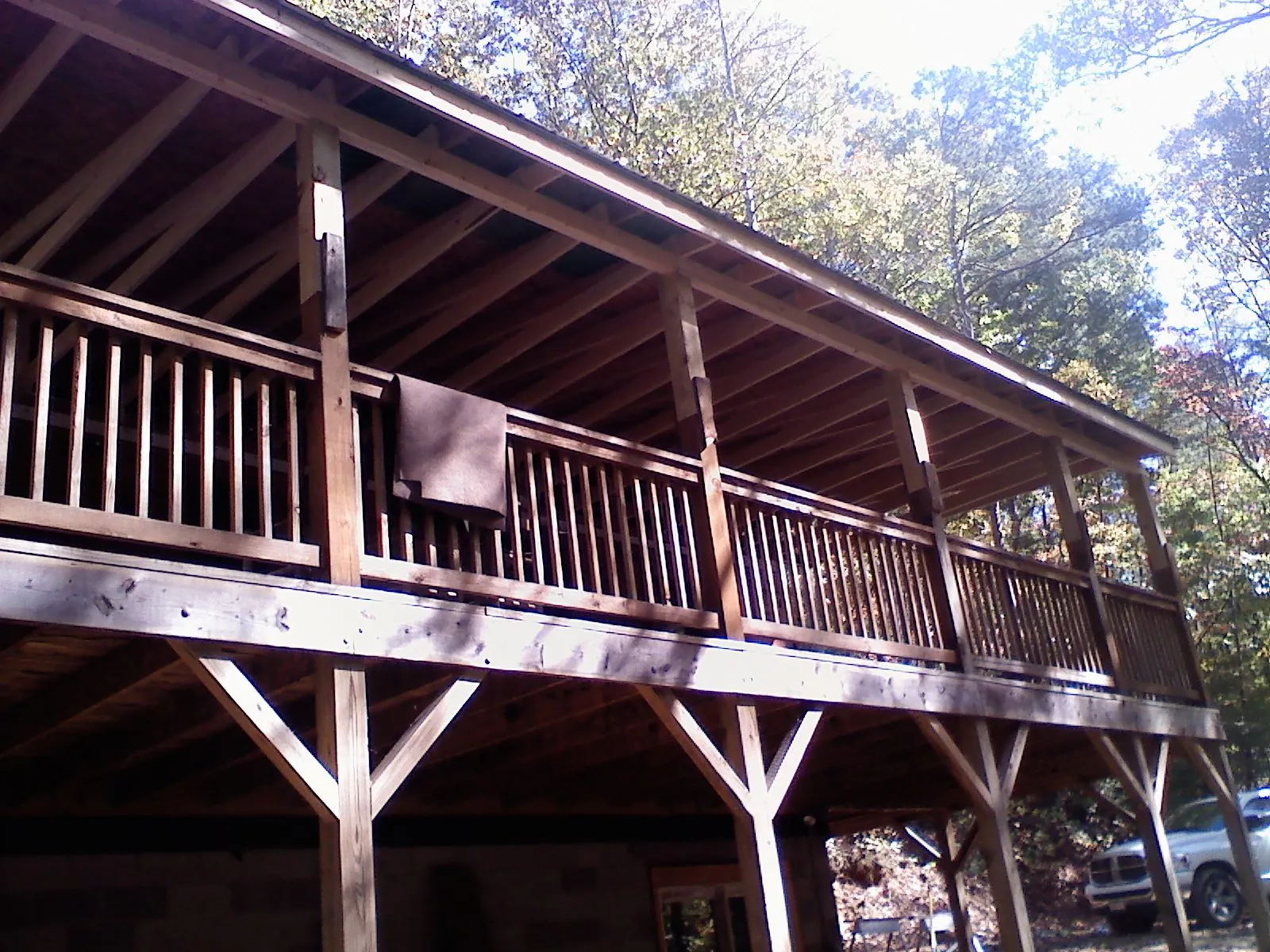 Timber framing under a new elevated porch and deck — Roof Leak Repair in Seattle by Roofing Brothers
